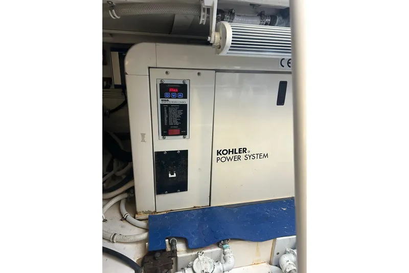  Yacht Photos Pics Kohler power system in 2005 Bertram 390 Convertible engine room.