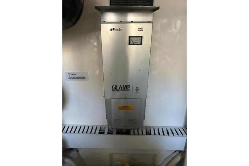  Yacht Photos Pics 60 AMP battery charger in 2005 Bertram 390 Convertible yacht engine room.