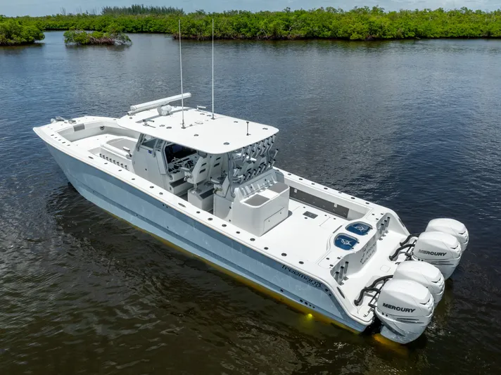  Yacht Photos Pics 2019 Freeman 42 LR boat with twin Mercury engines on calm water.