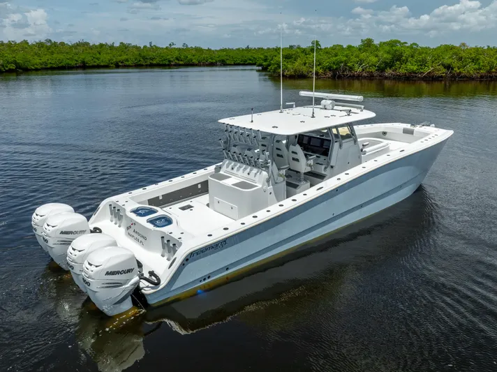  Yacht Photos Pics 2019 Freeman 42 LR boat with twin Mercury engines on calm water.