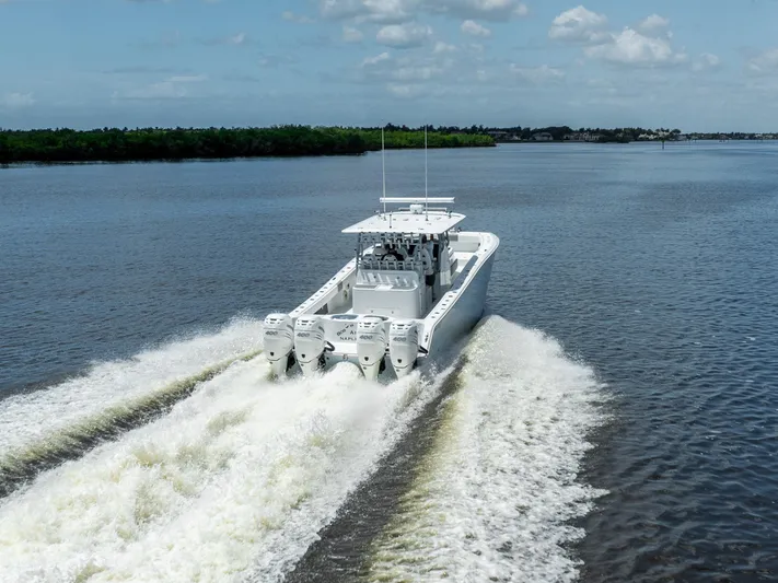  Yacht Photos Pics 2019 Freeman 42 LR boat cruising on a river.