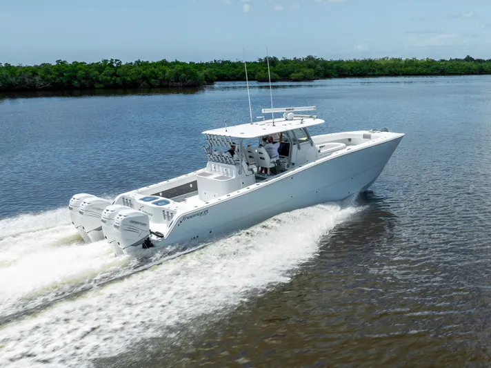  Yacht Photos Pics 2019 Freeman 42 LR boat cruising on a river.