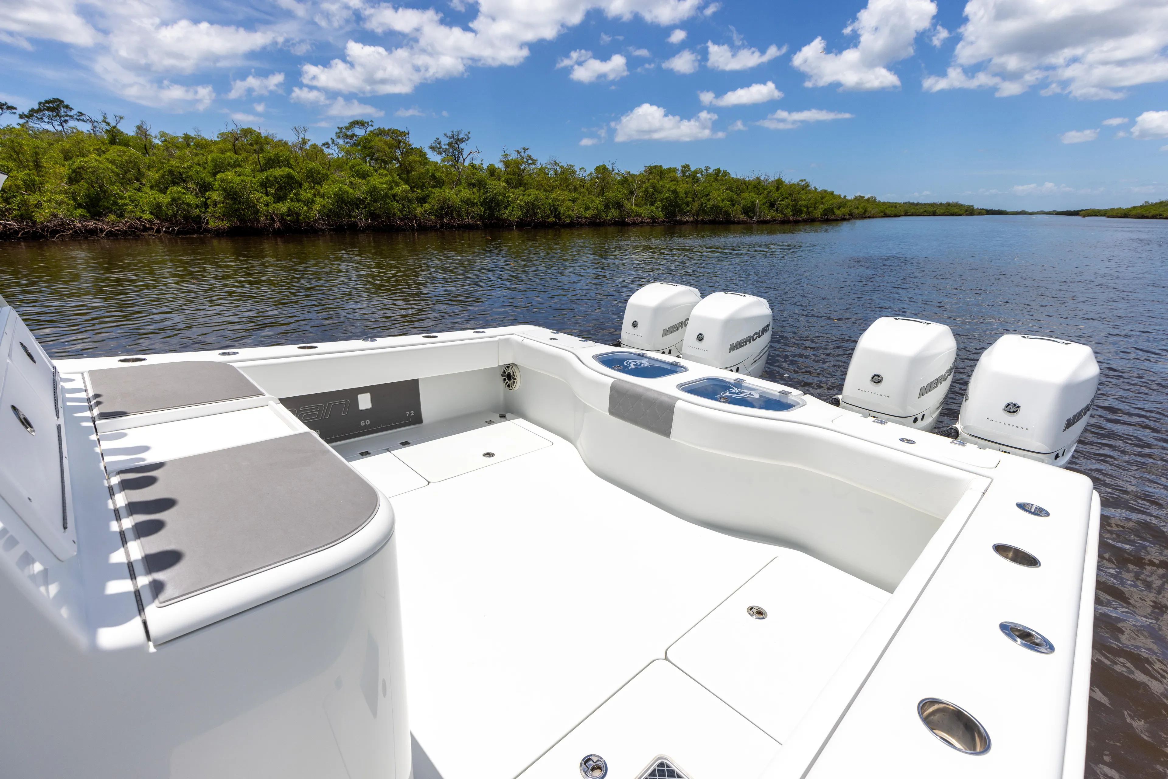  Yacht Photos Pics 2019 Freeman 42 LR boat with quad engines on a calm river.