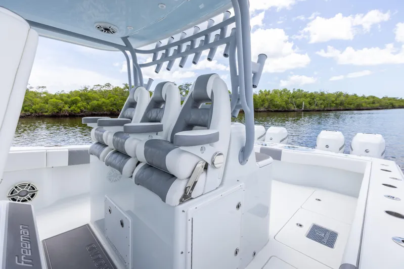  Yacht Photos Pics 2019 Freeman 42 LR boat interior with seating and rod holders.
