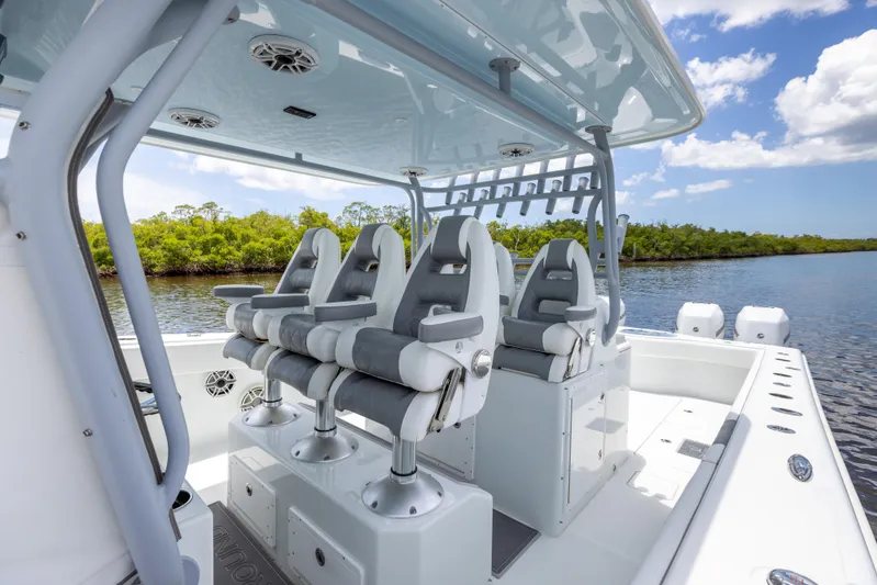  Yacht Photos Pics 2019 Freeman 42 LR boat interior with seating and rod holders.