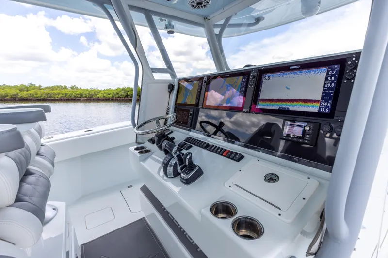  Yacht Photos Pics 2019 Freeman 42 LR boat cockpit with advanced navigation and control systems.