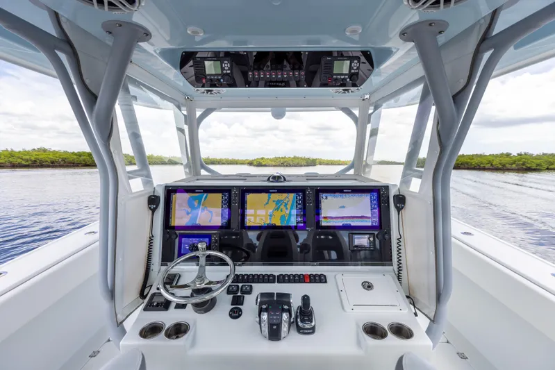 Yacht Photos Pics 2019 Freeman 42 LR boat cockpit with advanced navigation systems and controls.