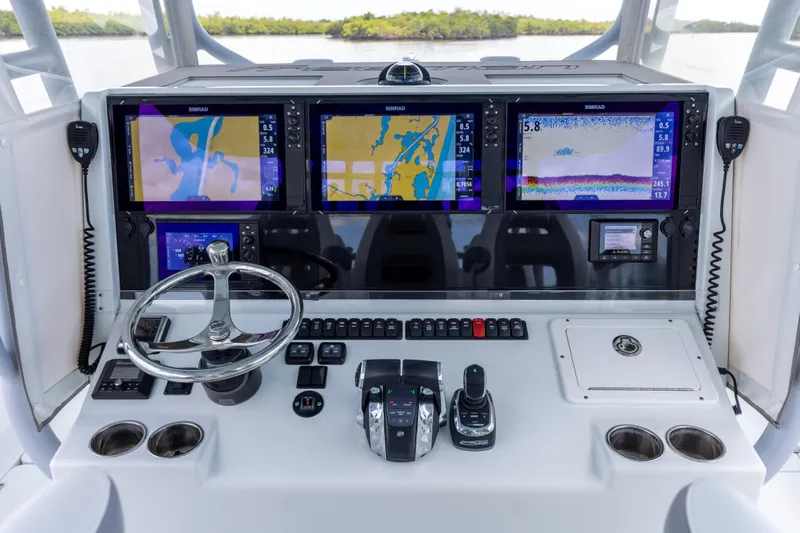  Yacht Photos Pics 2019 Freeman 42 LR boat dashboard with navigation screens and controls
