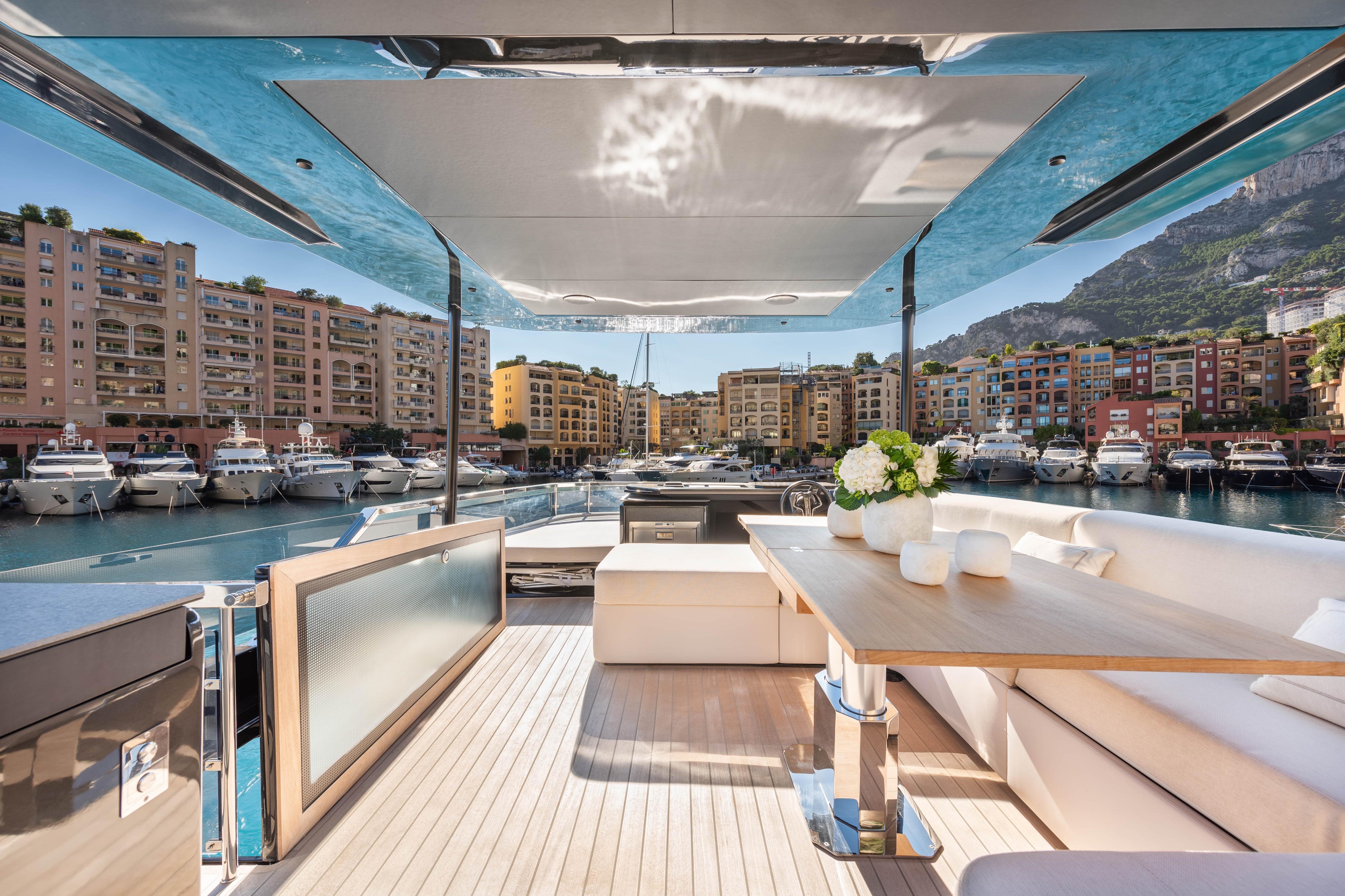 Luxurious Explorer 62 yacht interior with marina view, 2025 model.