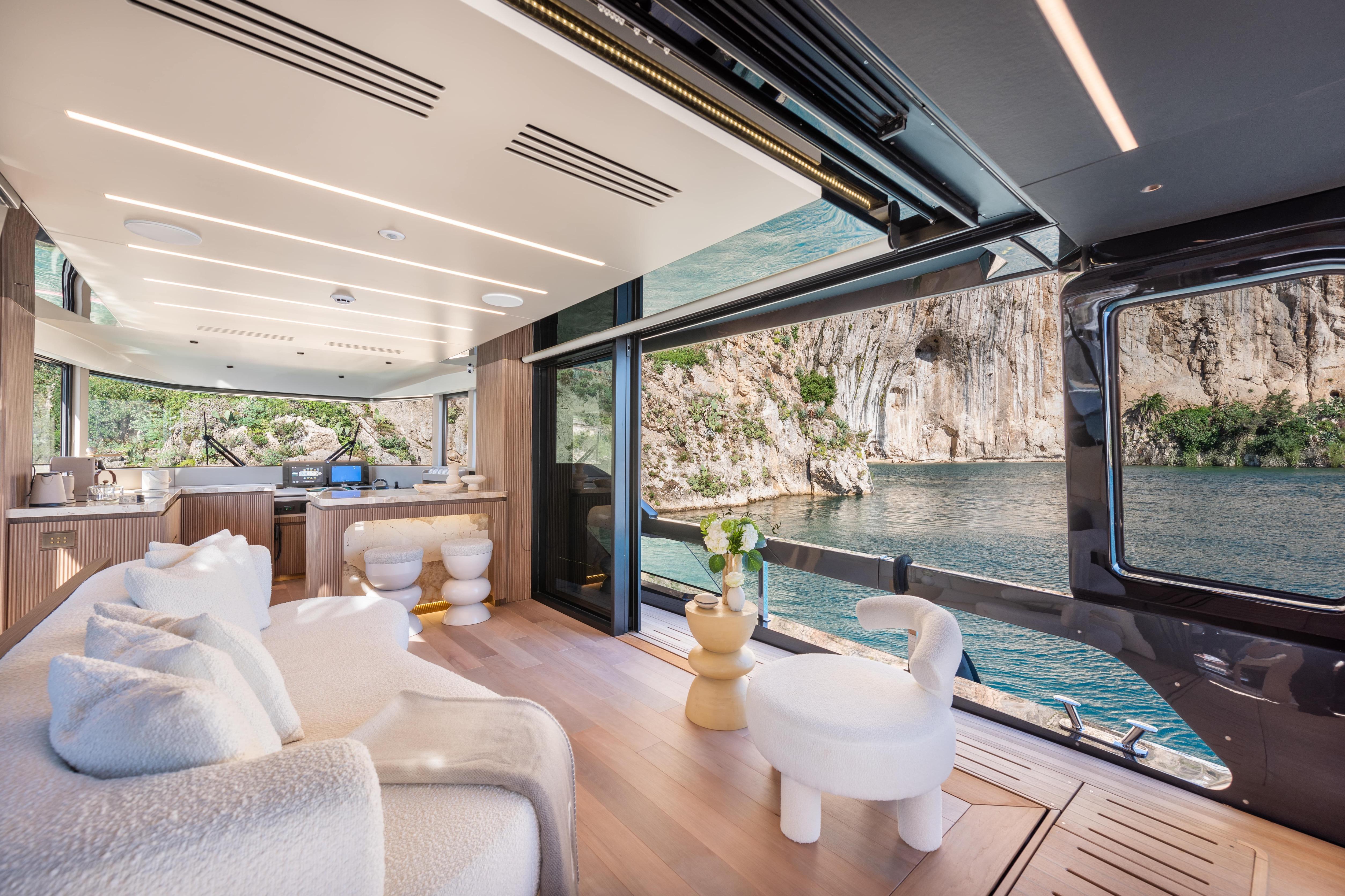 Luxurious interior of 2025 Explorer 62 yacht with scenic ocean view.