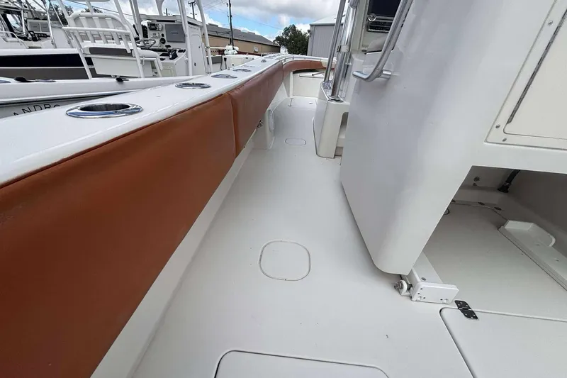  Yacht Photos Pics 2013 Andros Offshore 32 boat interior with brown seating and white deck.