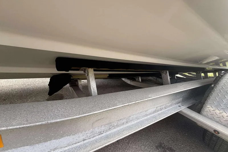  Yacht Photos Pics 2013 Andros Offshore 32 boat on trailer, showing hull and support structure.