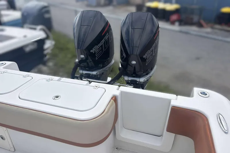  Yacht Photos Pics Twin outboard engines on a 2013 Andros Offshore 32 boat, dockside view.