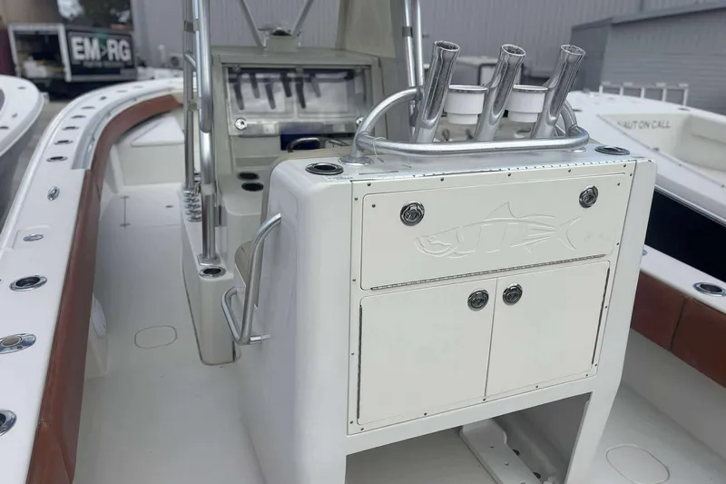  Yacht Photos Pics 2013 Andros Offshore 32 boat interior with rod holders and storage compartments.