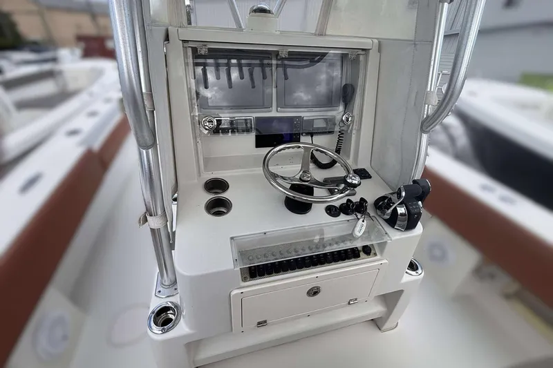  Yacht Photos Pics 2013 Andros Offshore 32 boat console with steering wheel and controls.