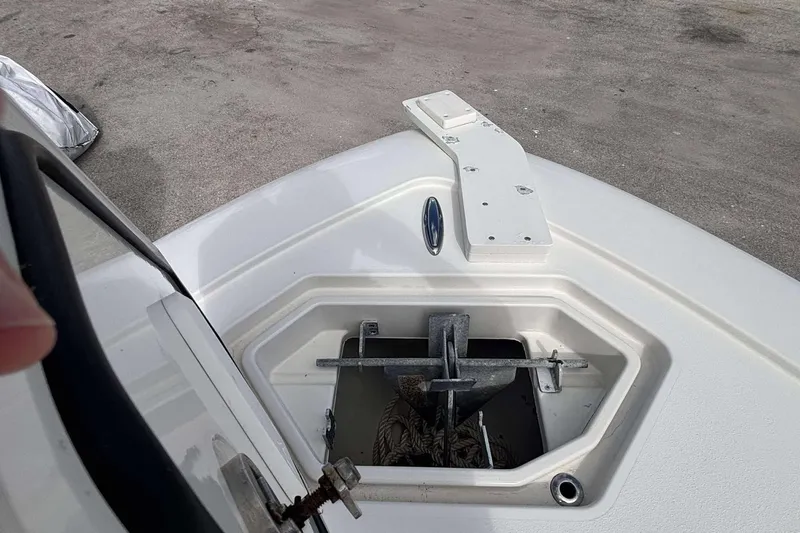  Yacht Photos Pics Bow of 2013 Andros Offshore 32 boat with anchor compartment open.