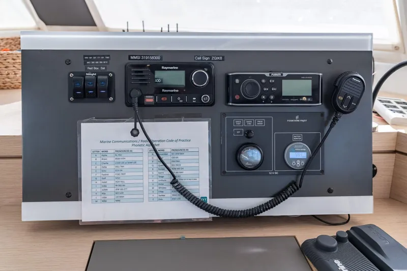 Grand Crew Yacht Photos Pics Control panel of a 2019 Fountaine Pajot 47 catamaran with communication equipment.