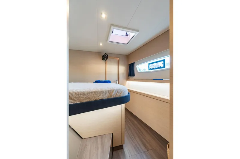 Grand Crew Yacht Photos Pics Interior cabin of 2019 Fountaine Pajot 47 yacht, featuring modern design and natural lighting.