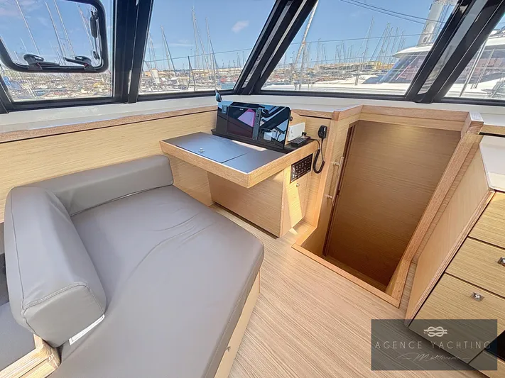 Kaija Yacht Photos Pics Nautitech 46 Open 2022 interior with navigation station and seating area.