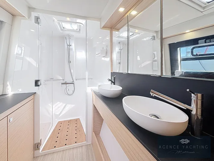 Kaija Yacht Photos Pics Luxurious bathroom in 2022 Nautitech 46 Open yacht with modern fixtures and elegant design.