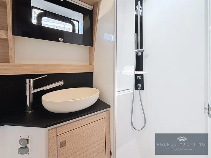 Kaija Yacht Photos Pics Modern bathroom in 2022 Nautitech 46 Open yacht with sleek sink and shower.