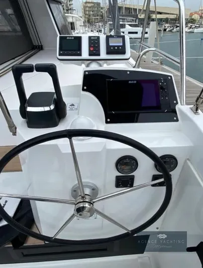 Kaija Yacht Photos Pics Steering wheel and navigation controls on a 2022 Nautitech 46 Open catamaran.