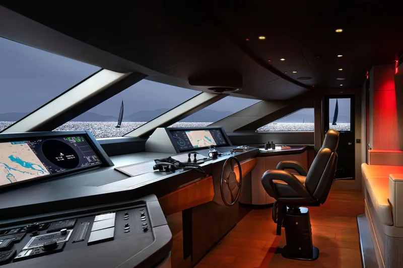  Yacht Photos Pics Luxurious yacht helm of 2022 Custom Line 140', featuring advanced navigation systems.