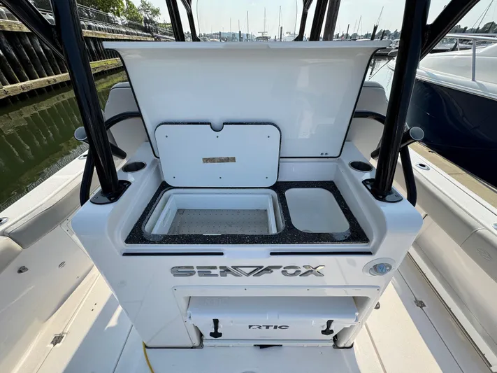 O4 Yacht Photos Pics 2022 Sea Fox 328 Commander boat interior with open storage compartments.