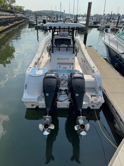 O4 Yacht Photos Pics 2022 Sea Fox 328 Commander boat with twin 400 engines docked at marina.