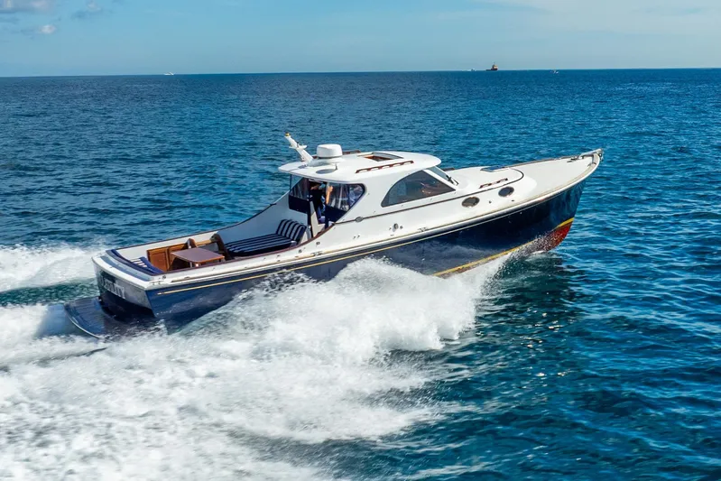 Volatility Yacht Photos Pics 2003 San Juan SJ 38 yacht cruising on open blue sea.