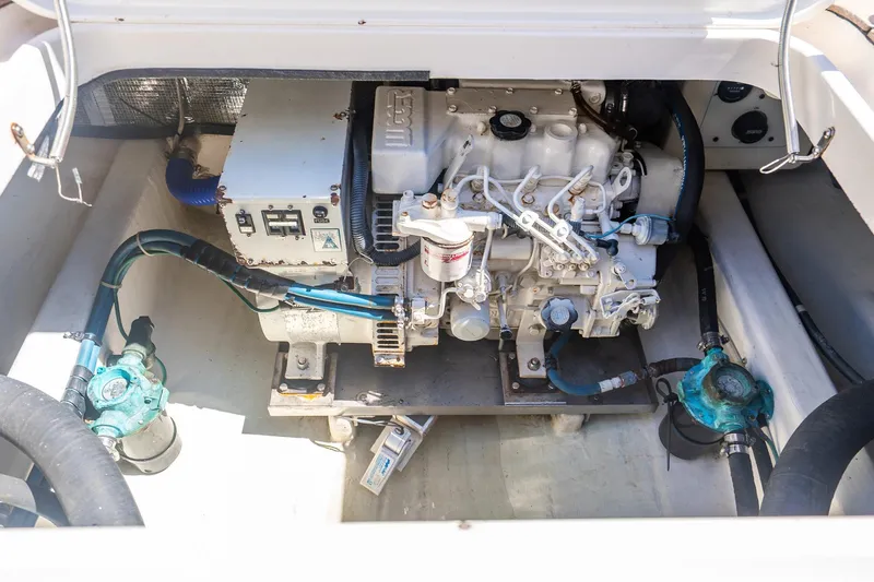 Volatility Yacht Photos Pics Engine compartment of a 2003 San Juan SJ 38 boat, showcasing mechanical components.