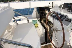 Isola Yacht Photos Pics 2018 Leopard 40 yacht cockpit with steering wheel and seating.