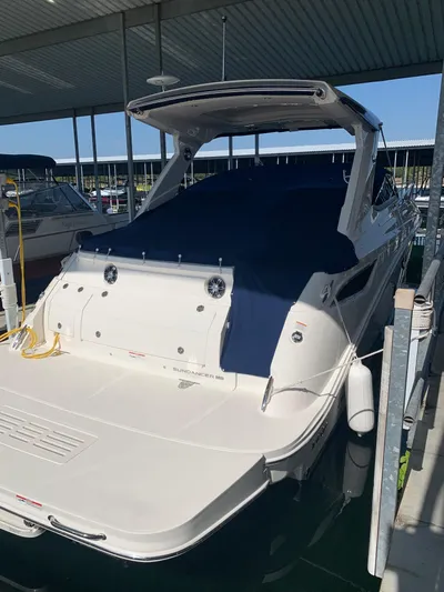 Lady Faby Yacht Photos Pics 2019 Sea Ray Sundancer 350 docked under a covered marina.