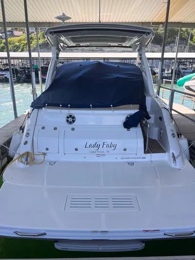 Lady Faby Yacht Photos Pics 2019 Sea Ray Sundancer 350 docked, rear view with covered seating area.
