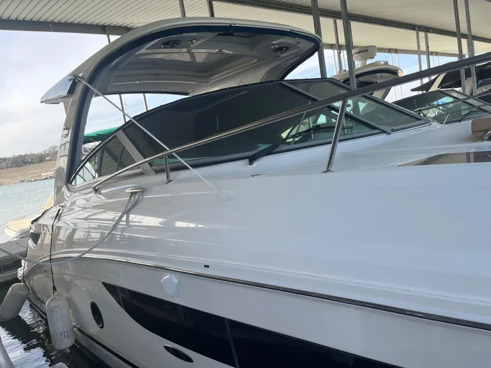Lady Faby Yacht Photos Pics 2019 Sea Ray Sundancer 350 yacht docked under a covered marina.