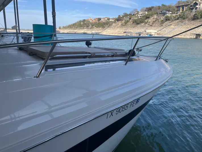 Lady Faby Yacht Photos Pics 2019 Sea Ray Sundancer 350 docked on a sunny day, showcasing sleek design and railing.