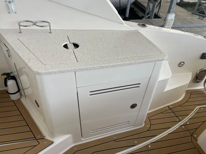 Lady Faby Yacht Photos Pics 2019 Sea Ray Sundancer 350 boat deck with sleek countertop and storage.