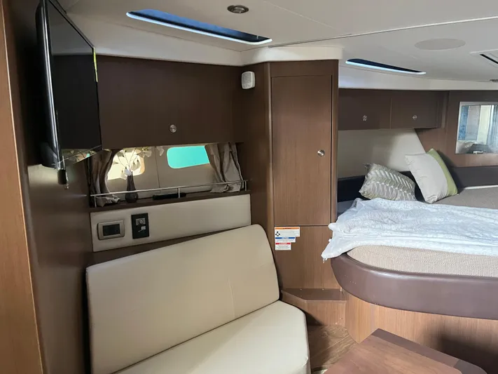 Lady Faby Yacht Photos Pics 2019 Sea Ray Sundancer 350 interior with bed, seating, and modern wood finishes.