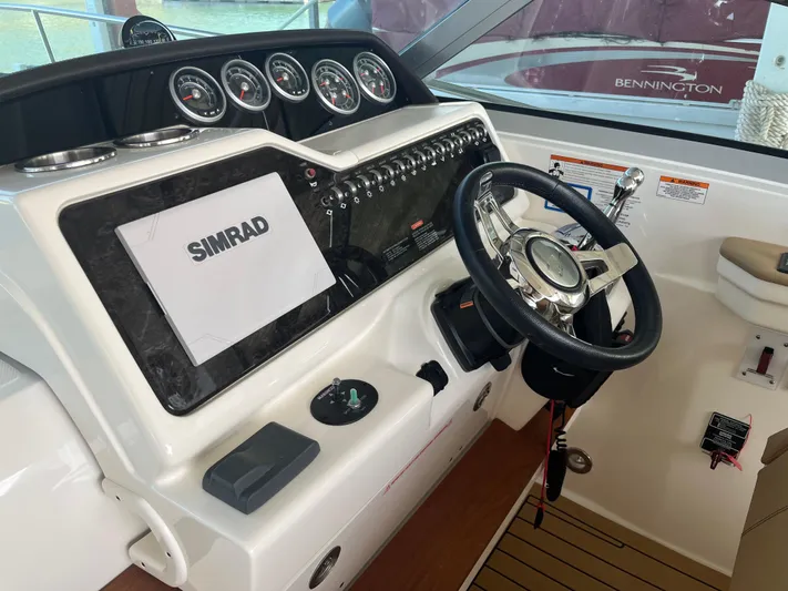 Lady Faby Yacht Photos Pics 2019 Sea Ray Sundancer 350 helm with Simrad display and steering wheel.