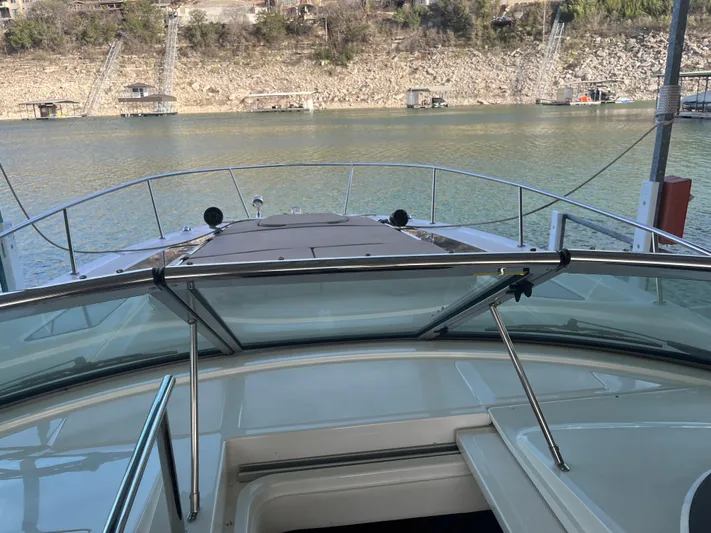 Lady Faby Yacht Photos Pics 2019 Sea Ray Sundancer 350 yacht on calm water, viewed from the deck.