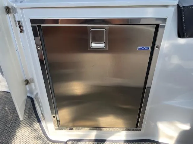  Yacht Photos Pics Stainless steel door on 2022 Monterey 295 Sport Yacht, featuring a sleek design.