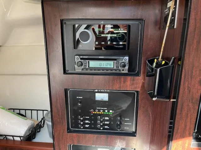  Yacht Photos Pics Control panel of 2022 Monterey 295 Sport Yacht with audio system and switches.