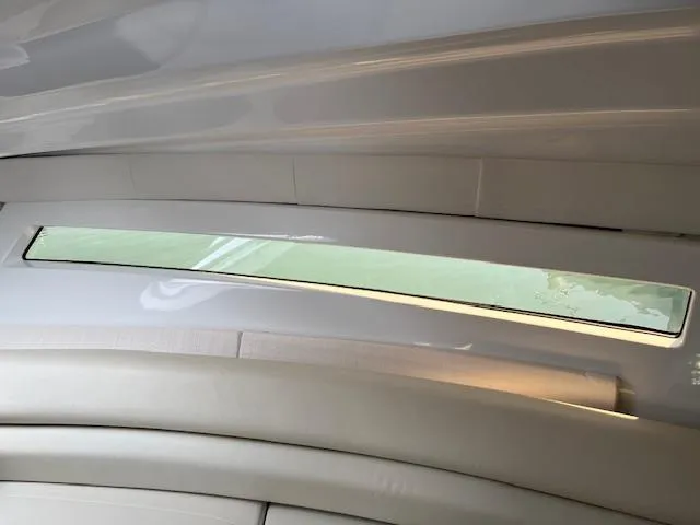  Yacht Photos Pics Interior view of 2022 Monterey 295 Sport Yacht with sleek window design.