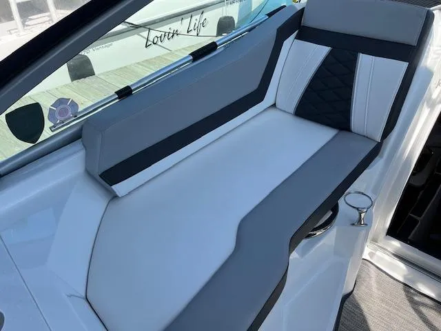  Yacht Photos Pics 2022 Monterey 295 Sport Yacht interior seating with modern design and comfortable upholstery.