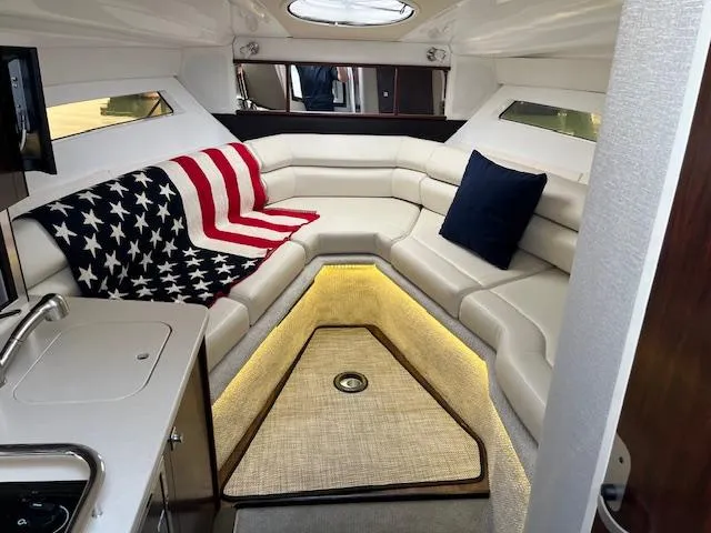  Yacht Photos Pics Luxurious interior of 2022 Monterey 295 Sport Yacht with American flag decor.
