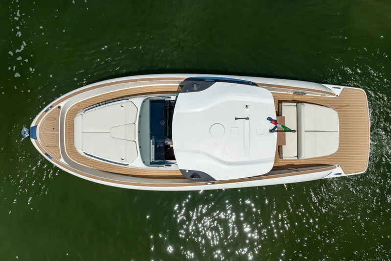  Yacht Photos Pics 2024 Solaris Power 40 Open yacht, aerial view, sleek design, luxurious deck, cruising on water.
