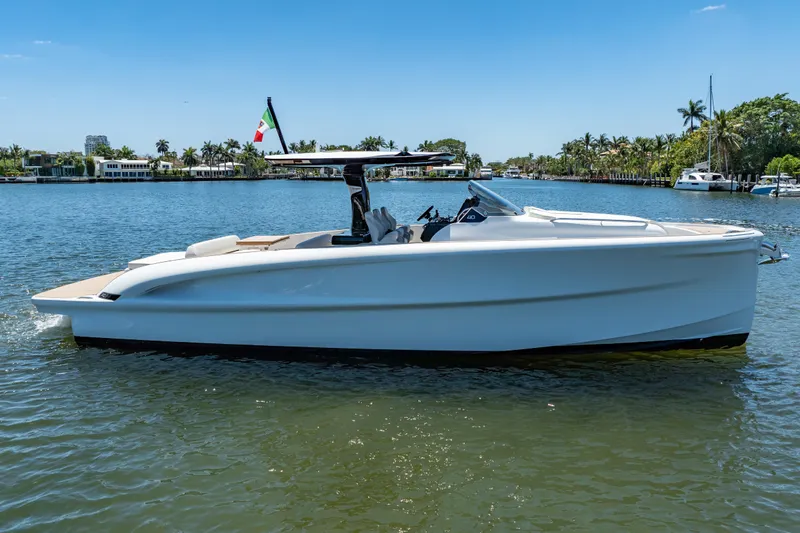  Yacht Photos Pics 2024 Solaris Power 40 Open yacht cruising on a sunny day, featuring sleek design and modern amenities.