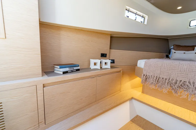  Yacht Photos Pics Luxurious interior of 2024 Solaris Power 40 Open yacht with modern wooden design.