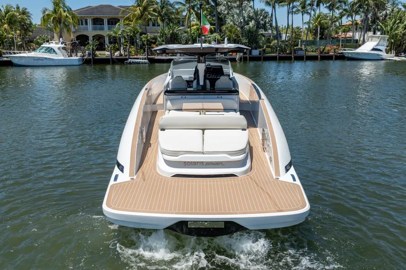  Yacht Photos Pics 2024 Solaris Power 40 Open yacht on water, showcasing sleek design and spacious deck.