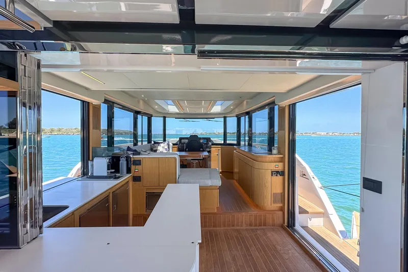 Da Mare Yacht Photos Pics Luxurious interior of 2023 OKEAN 52 yacht with panoramic ocean views.